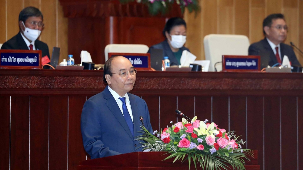 Chủ tịch nước Nguyễn Xuân Phúc: Cùng nhau, Việt Nam-Lào nhất định sẽ phát triển mạnh